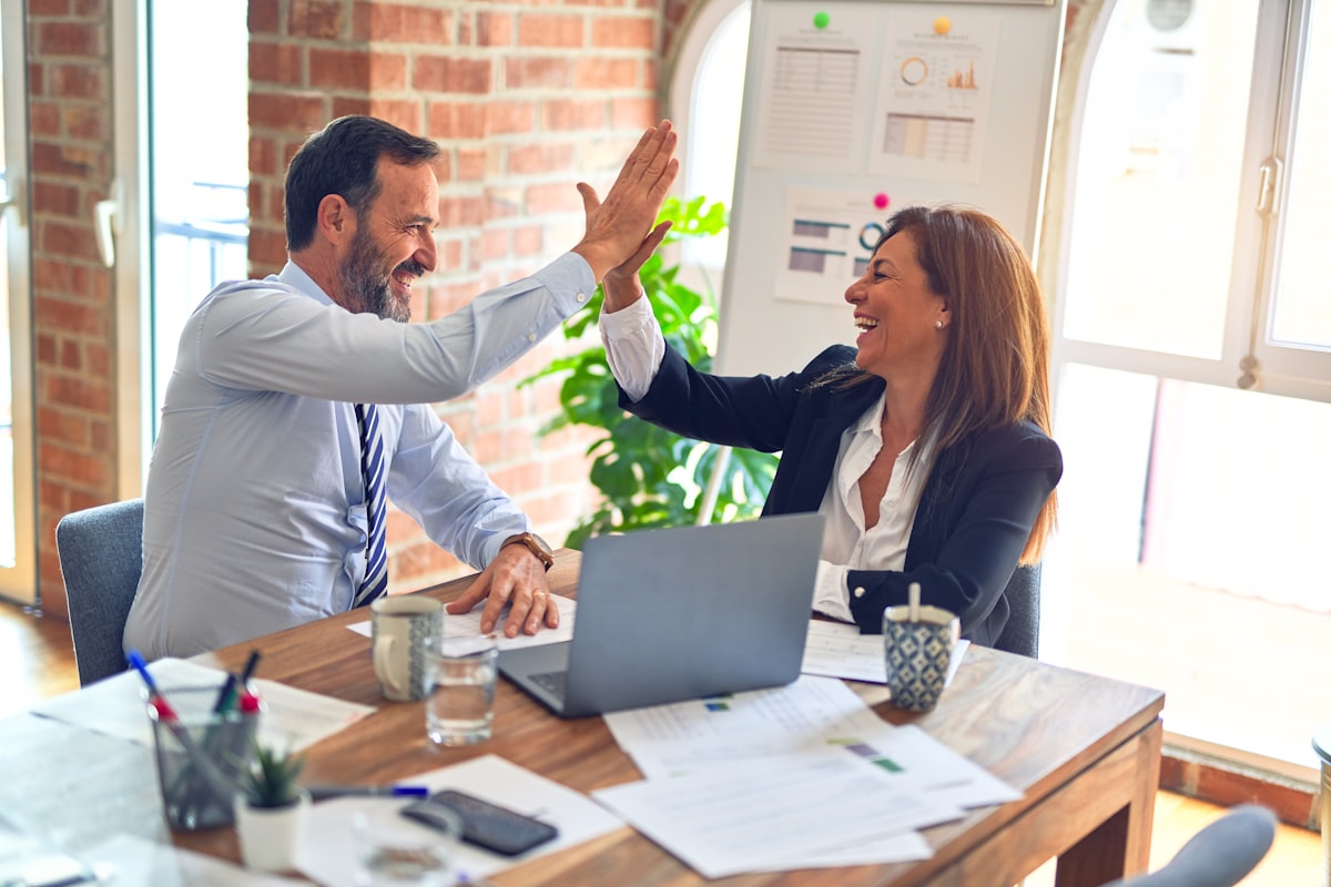 Happy business team collaborating on a marketing strategy